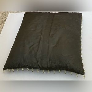 Decorative pillows with plastic beaded trim. Forest green